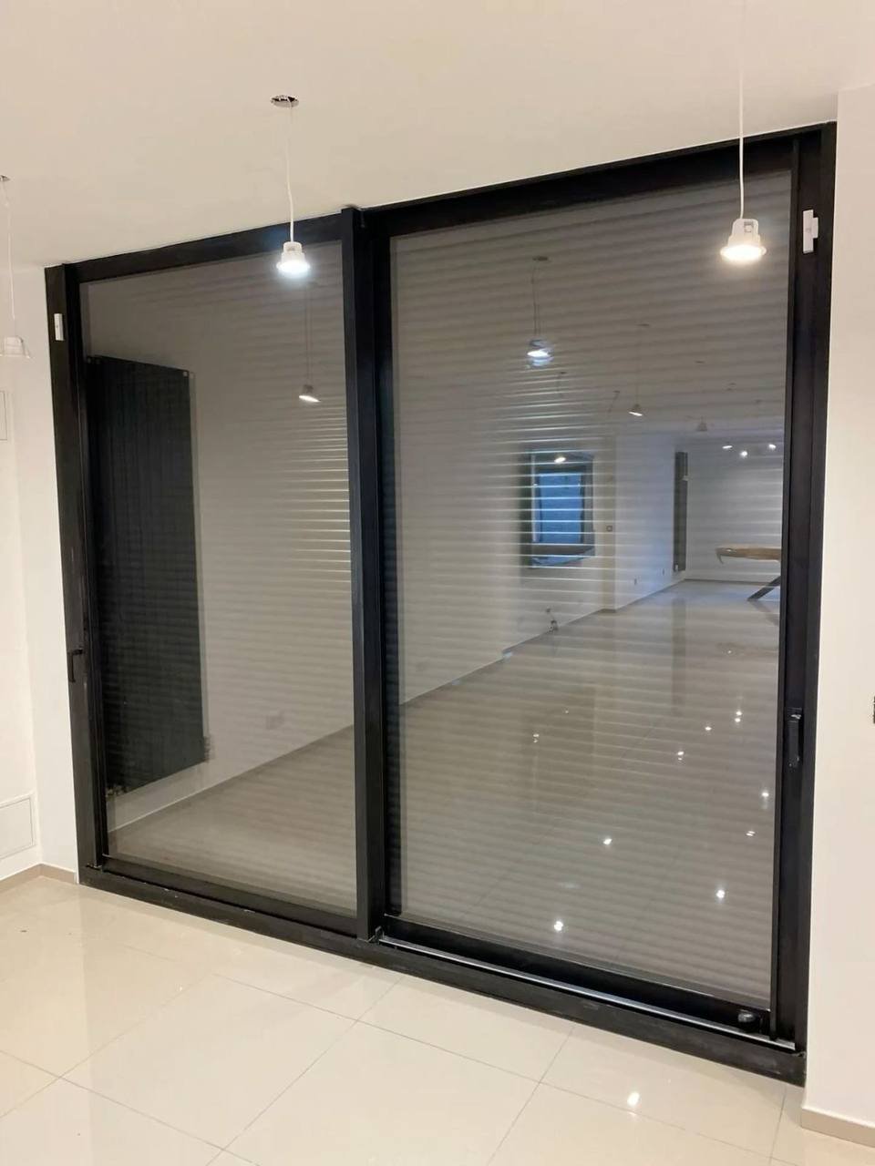 Baie vitrée coulissante en aluminium posée par Heaven Home à Marcory, Abidjan